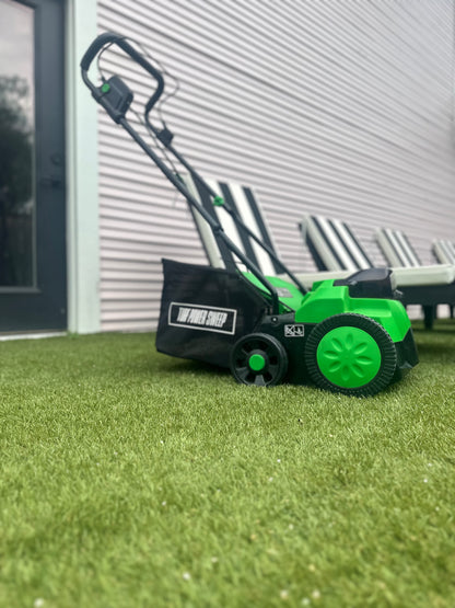 Green and Black Turf Power Sweep On Artificial Grass That Has Been Cleaned